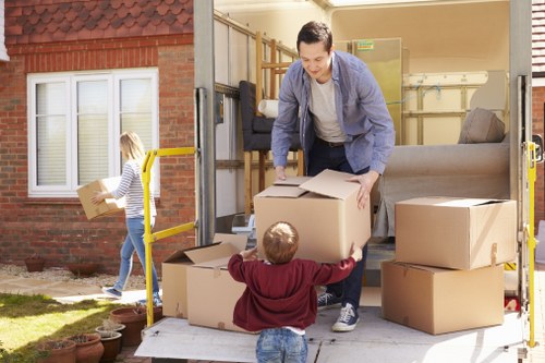 Local removals van loading furniture for a home move in Wandsworth
