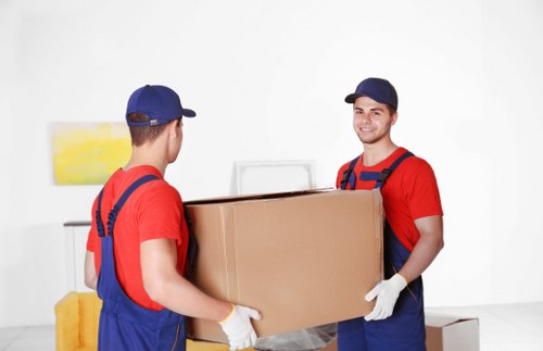 Removal team planning a home move in a Wandsworth street