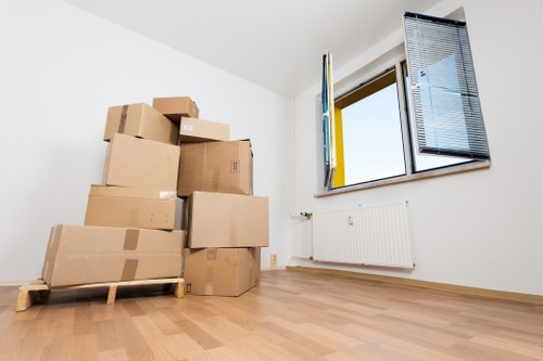 Professional Wandsworth moving team handling household items carefully