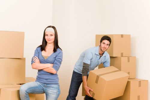 Worker handling household items with care
