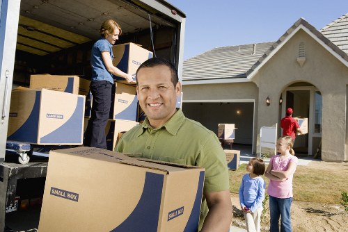 Moving boxes and protective wrapping used by a local removal company