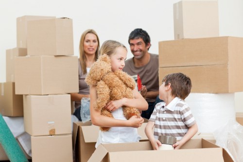 Professional movers transporting household items during a Wandsworth relocation